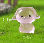 Glow in the dark pink bunny and puppy figurines