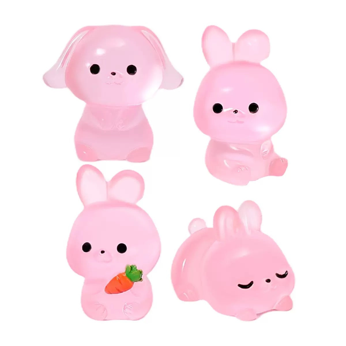 Glow in the dark pink bunny and puppy figurines