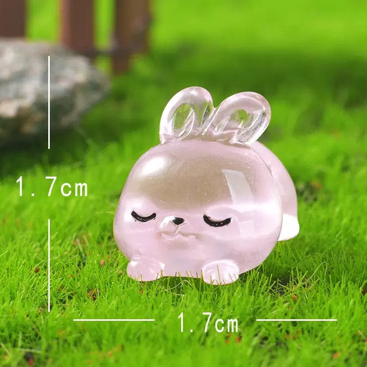 Glow in the dark pink bunny and puppy figurines