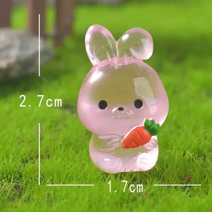 Glow in the dark pink bunny and puppy figurines