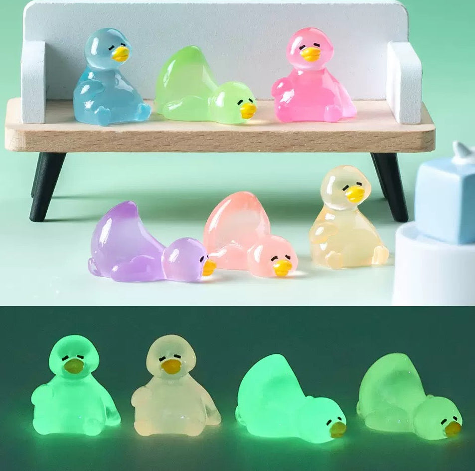 Colorful glow in the dark duck resin charms display