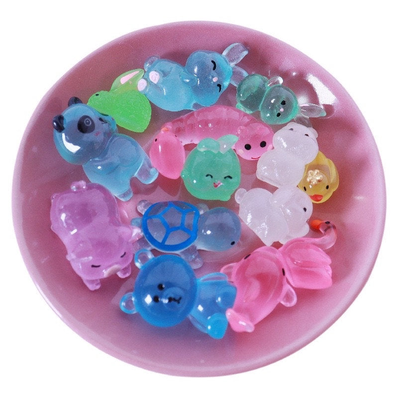 Glow in the dark animal charms in assorted colours and designs