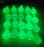 Glow in the dark seal pup resin charms approximately 17 by 10 mm