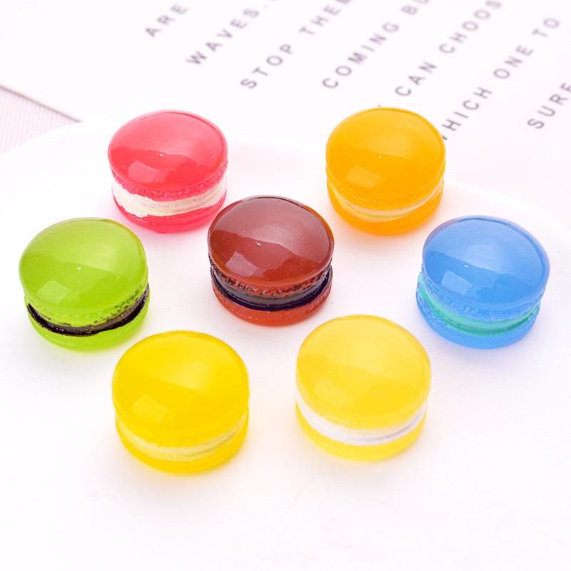 Glow in the dark macaron resin charms in assorted colors approximately 14 by 19 mm