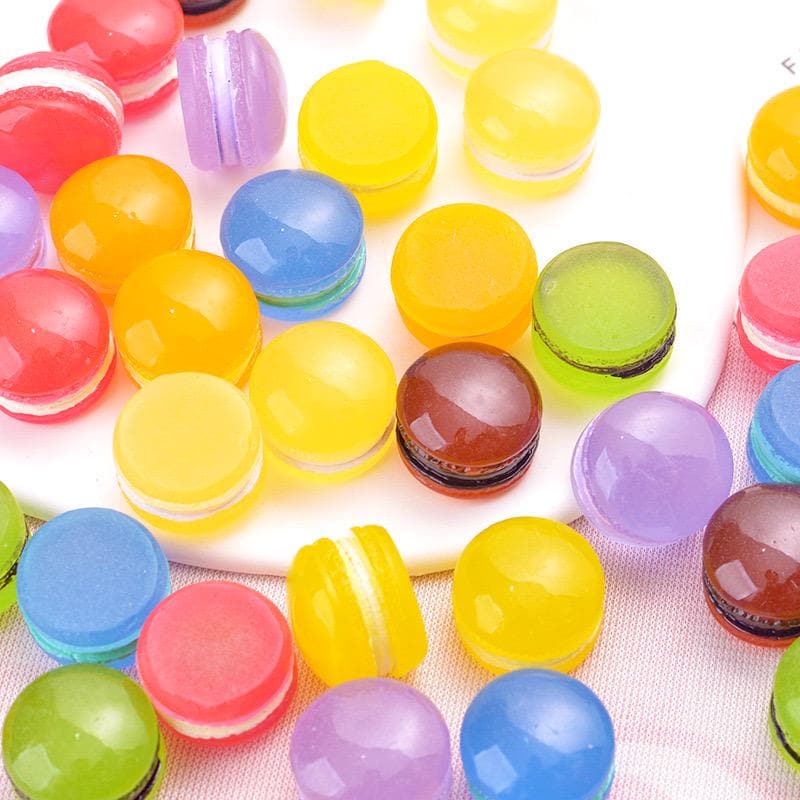 Glow in the dark macaron resin charms in assorted colors approximately 14 by 19 mm