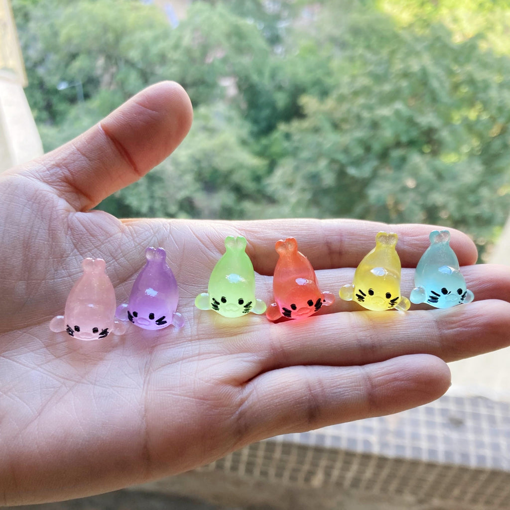 Small glow in the dark seal pup resin cabochons 11 by 17mm