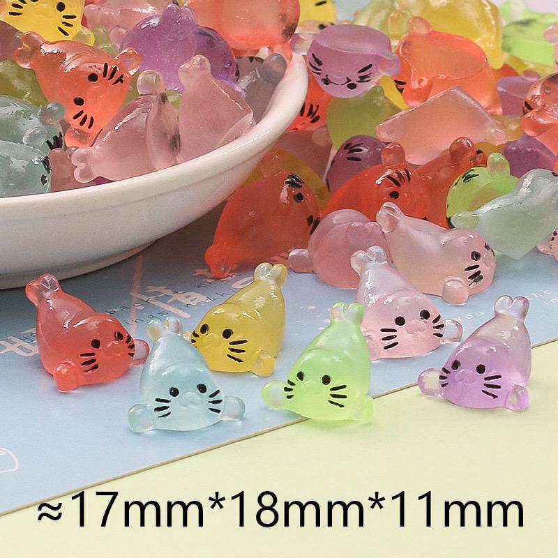 Small glow in the dark seal pup resin cabochons 11 by 17mm