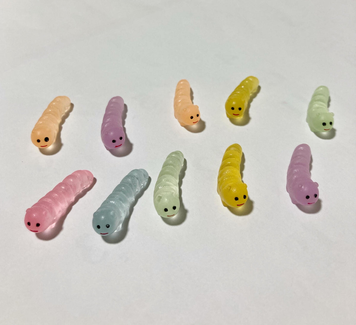 Cute glow in the dark caterpillar resin cabochons for DIY crafts