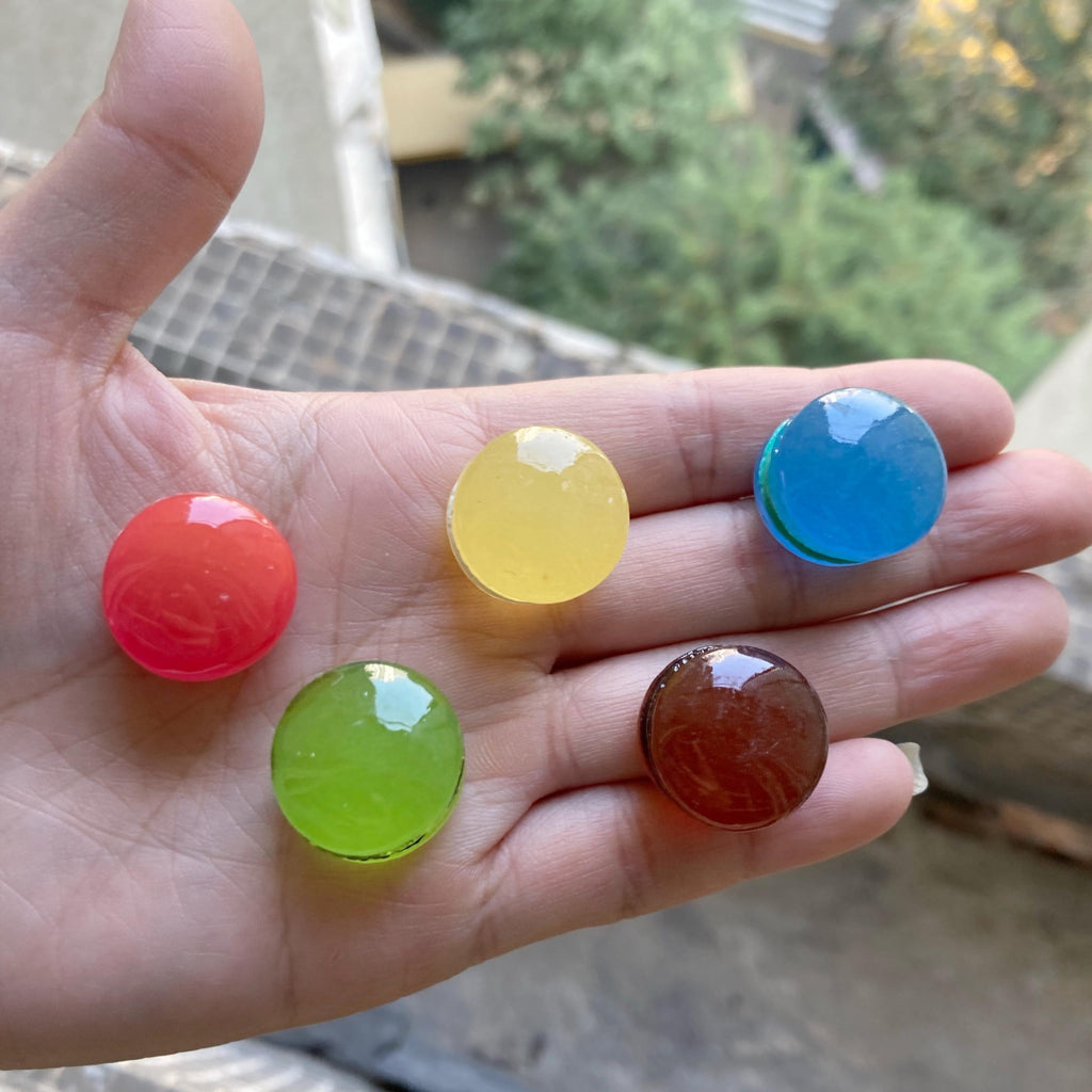 Glow in the dark macaron resin charms in assorted colors approximately 14 by 19 mm