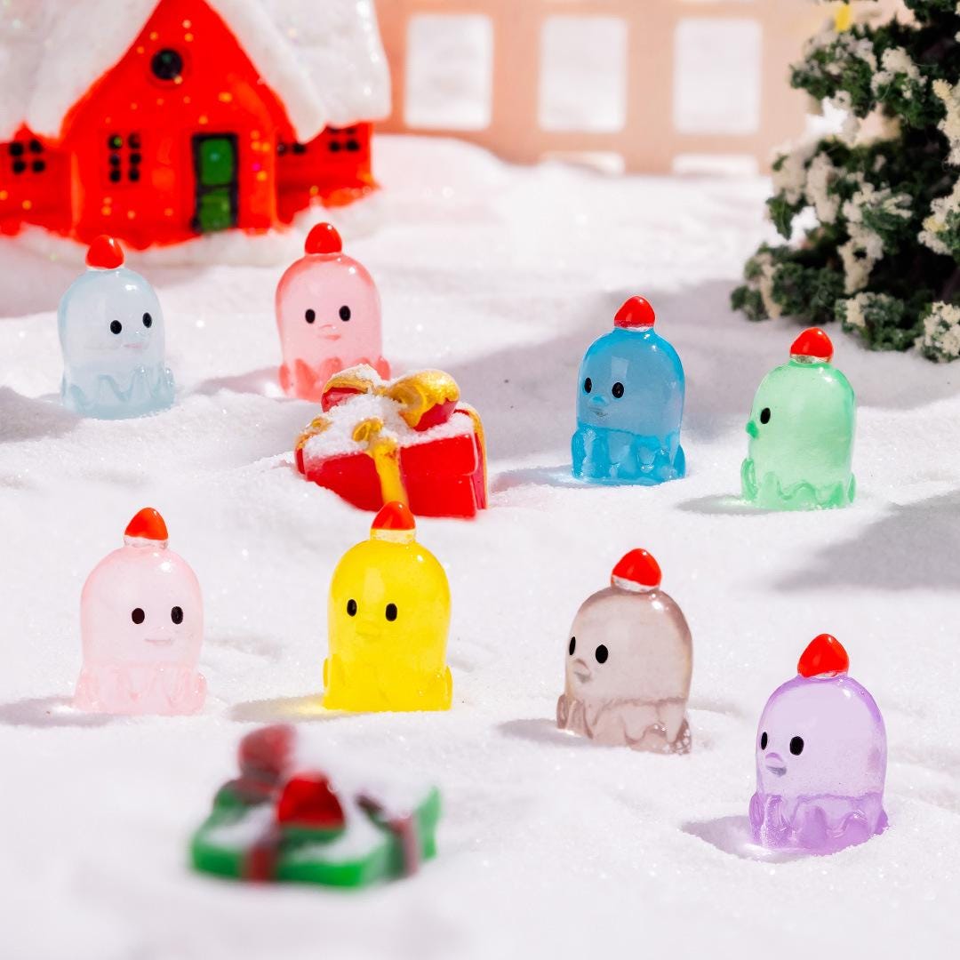 Glow in the dark Christmas duck charms with Santa hats