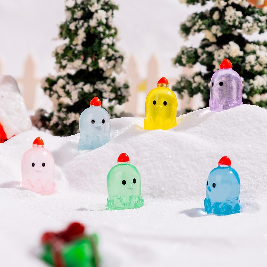 Glow in the dark Christmas duck charms with Santa hats