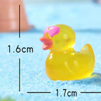 Glow in the dark yellow duck resin charm product photo